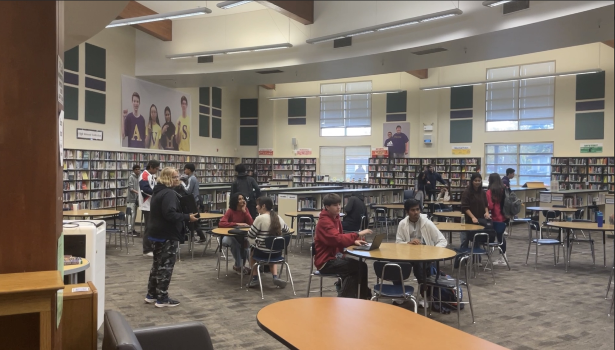 Students gathered up in the library to take the test under Mrs. Hasenpflug's supervision.